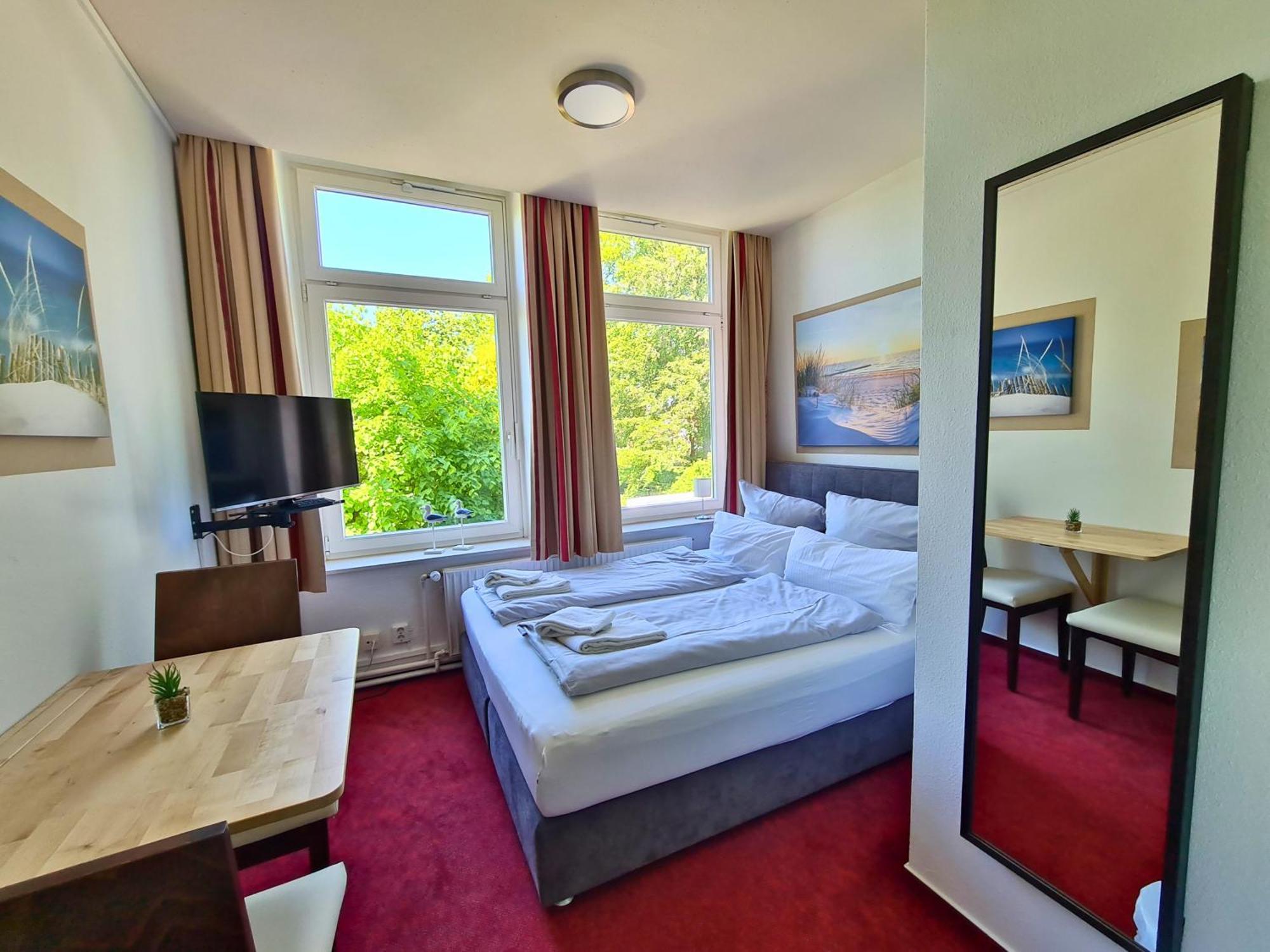 Zeitlos Hotel Garni Scharbeutz Buitenkant foto